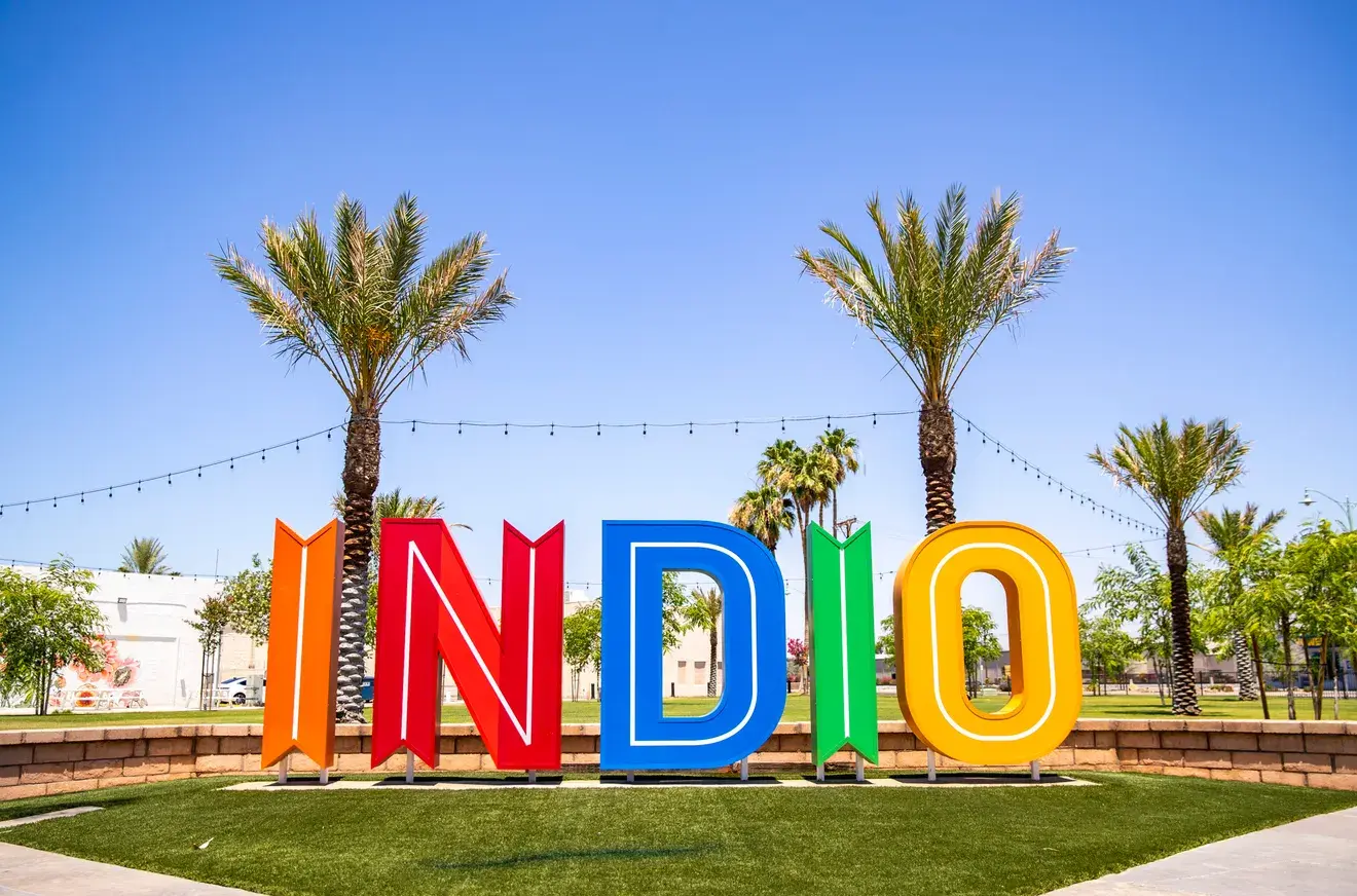 Glow Window Cleaning technician working on second-story windows.